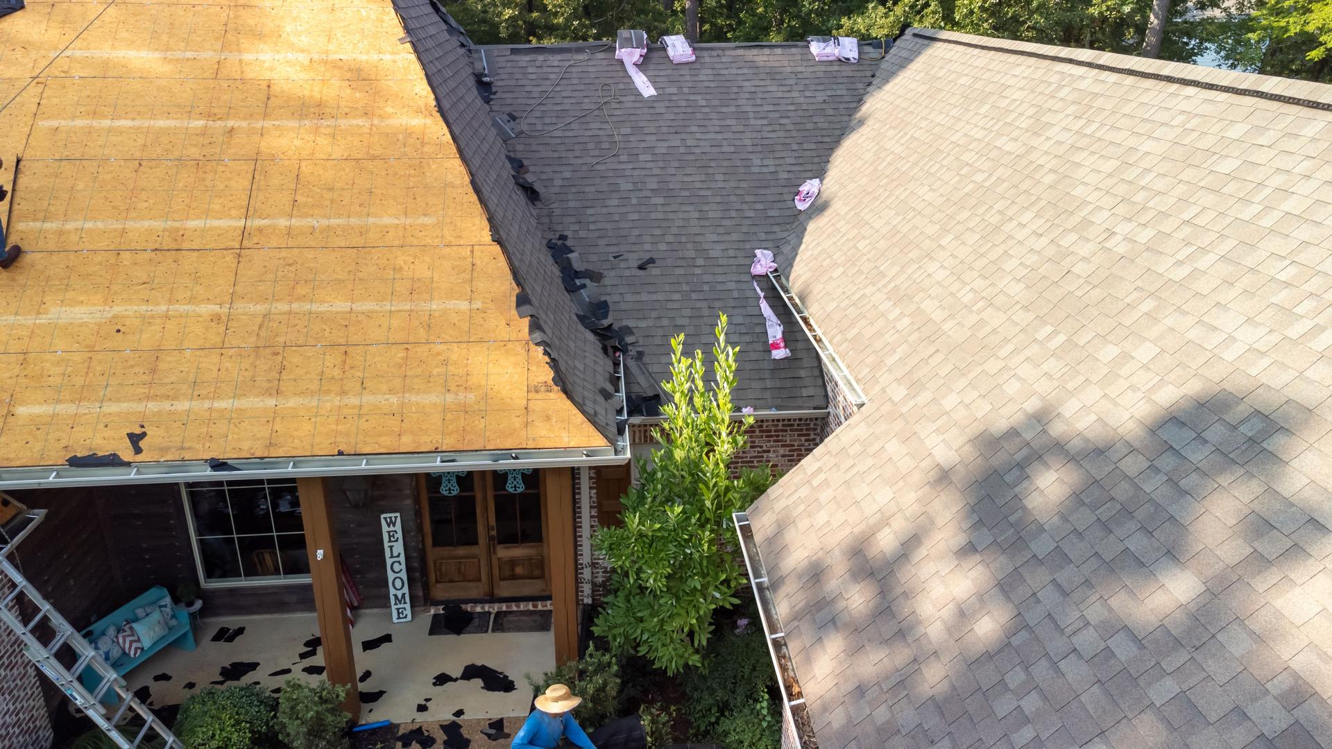 House with new roof being installed