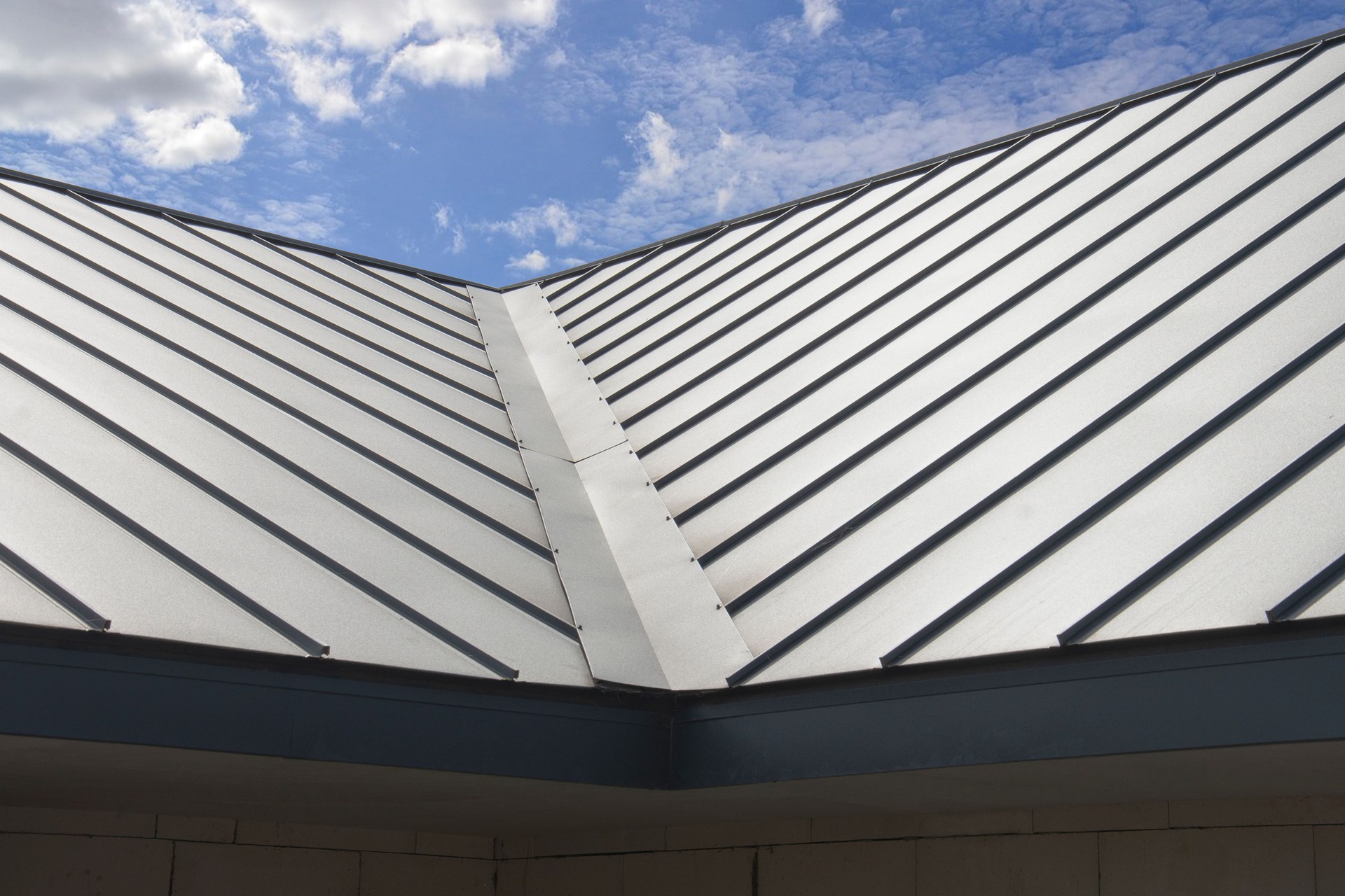 Standig Seam Metal Roof on sky background